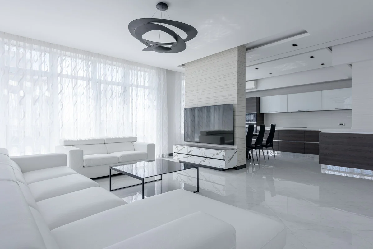 Smooth white ceiling and walls illuminated by natural light